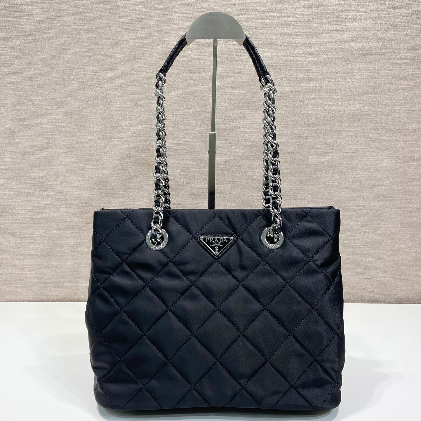 Pra*a top handle bags
